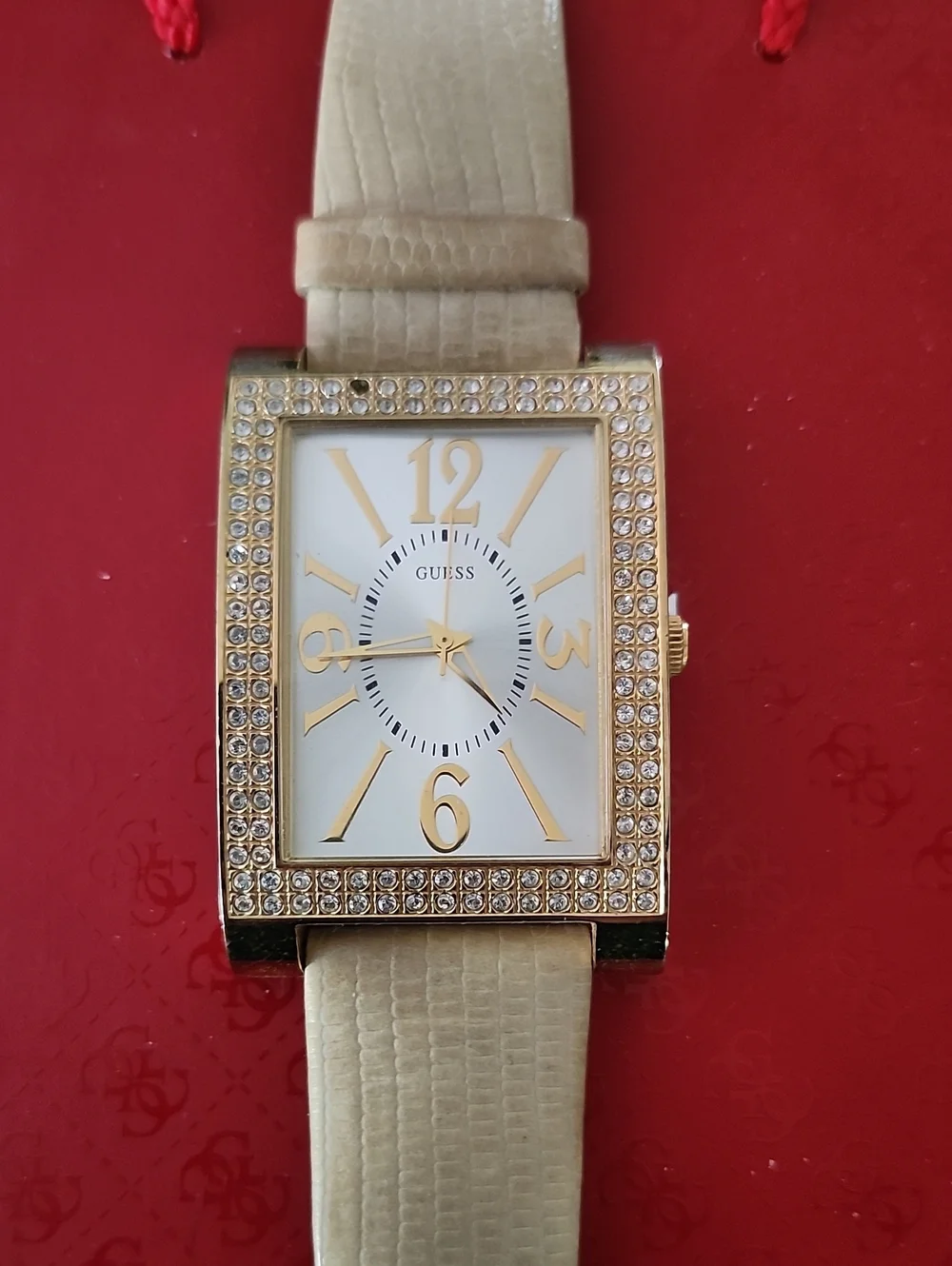 Guess Gold-Tone Swarovski Crystal-Trim Rectangular Watch with Cream Strap